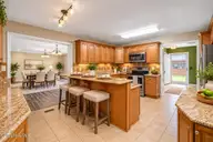 24 Delight Court, Jacksonville, NC 28546 — 3-bedroom home in McArthur Heights, Jacksonville, NC, photo 2 of 25: Kitchen with Furniture 1
