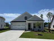 67 Lilaput Circle, Wilmington, NC 28411 — 3-bedroom home in Indigo at Abbey Preserve, Wilmington, NC, photo 1 of 27: 102FrontExterior