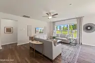 2025 Brisco Way 7, Leland, NC 28451 — 3-bedroom home in Brunswick Forest, Leland, NC, photo 6 of 23: Family Room