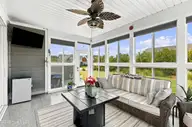 210 Knots Bend Drive, Hampstead, NC 28443 — 4-bedroom home in Salters Haven at Lea Marina, Hampstead, NC, photo 21 of 72: 68_screened porch