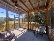 204 Diamond City Drive, Harkers Island, NC 28531 — 2-bedroom manufactured home in Earl Davis, Harkers Island, NC, photo 10 of 13: Back porch