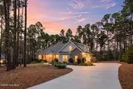 79 Stoneykirk Drive, Pinehurst, NC 28374 — 5-bedroom home in Pinewild CC, Pinehurst, NC, photo 2 of 67: Twilight