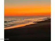 606 13 E Dolphin Drive, Oak Island, NC 28465 — waterfront lot in E. Long Beach, Oak Island, NC, photo 7 of 8