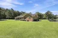 959 Halls Creek Road, Elizabeth City, NC 27909 — 3-bedroom waterfront home in Halls Creek Subdivision, Elizabeth City, NC, photo 6 of 53: Side of Home
