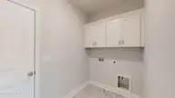 165 Devonshire Avenue W, West End, NC 27376 — 4-bedroom home in Seven Lakes South, West End, NC, photo 17 of 19: 165-W-Devonshire-Ave-Laundry