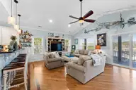1404 W Yacht Drive, Oak Island, NC 28465 — 3-bedroom waterfront home in Pinners Point, Oak Island, NC, photo 8 of 46: living room