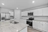 5338 Meagan Lane NE, Winnabow, NC 28479 — 4-bedroom home in Country Walk, Winnabow, NC, photo 18 of 55: 24_kitchen