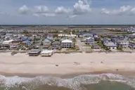1423 N Shore Drive, Surf City, NC 28445 — 5-bedroom waterfront home in Del Mar Beach, Surf City, NC, photo 4 of 75: 1423NShoreDriveDrone-7
