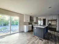 104 Dundee Trail, Holly Ridge, NC 28445 — 3-bedroom manufactured home, Holly Ridge, NC, photo 15 of 22: Back Slider Door
