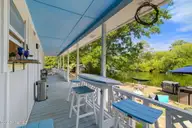 714 Cockle Street, Surf City, NC 28445 — 3-bedroom waterfront home in Gabes Point, Surf City, NC, photo 6 of 38: 55-web-or-mls-GI - 714 Cockle St - Listi