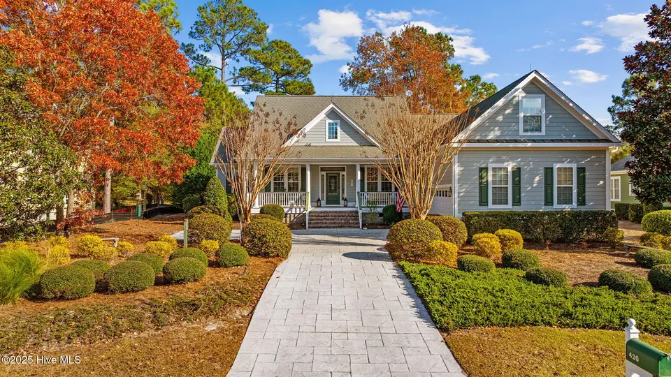 420 Cypress Ridge Drive SE, Bolivia, NC 28422 — 3-bedroom waterfront home in Winding River Plantation, Bolivia, NC, photo 1 of 50: 2-web-or-mls-DJI_20251119135721_0593_D