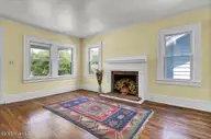 1912 Nun Street, Wilmington, NC 28403 — 4-bedroom home in Ardmore, Wilmington, NC, photo 6 of 35: Living Room Fireplace
