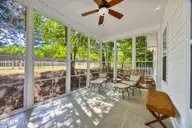 1235 Burning Tree Road 12, Pinehurst, NC 28374 — 3-bedroom home in Unit 12, Pinehurst, NC, photo 17 of 24: 3-season porch