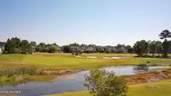 6793 25 Waterstone Crossing SW, Ocean Isle Beach, NC 28469 — waterfront lot in Ocean Ridge Plantation, Ocean Isle Beach, NC, photo 2 of 35