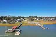 2018 34&35 Marsh Acres Court, Supply, NC 28462 — waterfront lot in Marsh Acres, Supply, NC, photo 16 of 19: Community Boat Dock and Ramp