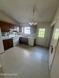 153 Pine Crest Drive, Jacksonville, NC 28546 — 2-bedroom townhome in Pinewood Downs, Jacksonville, NC, photo 3 of 7