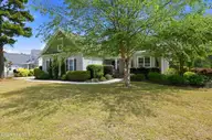 9385 Fallen Pear Lane NE, Leland, NC 28451 — 4-bedroom waterfront home in The Bluffs on the Cape Fear, Leland, NC, photo 6 of 68: 1_9385_fallen_pear_ln_ne_001