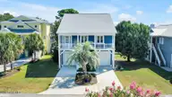 822 Cutter Court, Kure Beach, NC 28449 — 4-bedroom home in Kure Beach Village, Kure Beach, NC, photo 1 of 75