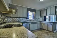 100 Wanda Drive, Pikeville, NC 27863 — 3-bedroom home in Sparrow Point, Pikeville, NC, photo 20 of 34: 100-Kitchen4