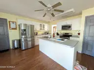 117 Longwood Drive, Stella, NC 28582 — 3-bedroom waterfront home in White Oak Landing, Stella, NC, photo 13 of 72: PXL_20240207_183333211