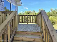 929 Hickman Road, Tabor City, NC 28463 — 2-bedroom home, Tabor City, NC, photo 7 of 18: Rear Porch