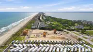 105 Ocean Promenade, Indian Beach, NC 28512 — 5-bedroom waterfront home in The Pearls Oceanside, Indian Beach, NC, photo 11 of 17: 9-print-DJI_20260505163932_0851_D