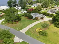 205 Austin Point Drive, Washington, NC 27889 — 4-bedroom waterfront home in Magnolia Shores, Washington, NC, photo 4 of 57: 5-web-or-mls-DJI_20260706095633_0002_D_e