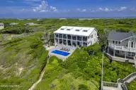 585 Forest Dunes Drive, Pine Knoll Shores, NC 28512 — 4-bedroom waterfront home in Beacon's Reach, Pine Knoll Shores, NC, photo 3 of 68: Oceanfront home in Beacon's Reach