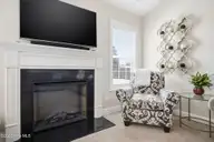 446 Meadowlark Drive, Winterville, NC 28590 — 3-bedroom home in Mellon Downs, Winterville, NC, photo 9 of 37: living_fireplace