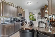 214 Weeping Willow Drive, La Grange, NC 28551 — 3-bedroom home in Willow Pond, La Grange, NC, photo 22 of 31: kitchen with breakfast bar