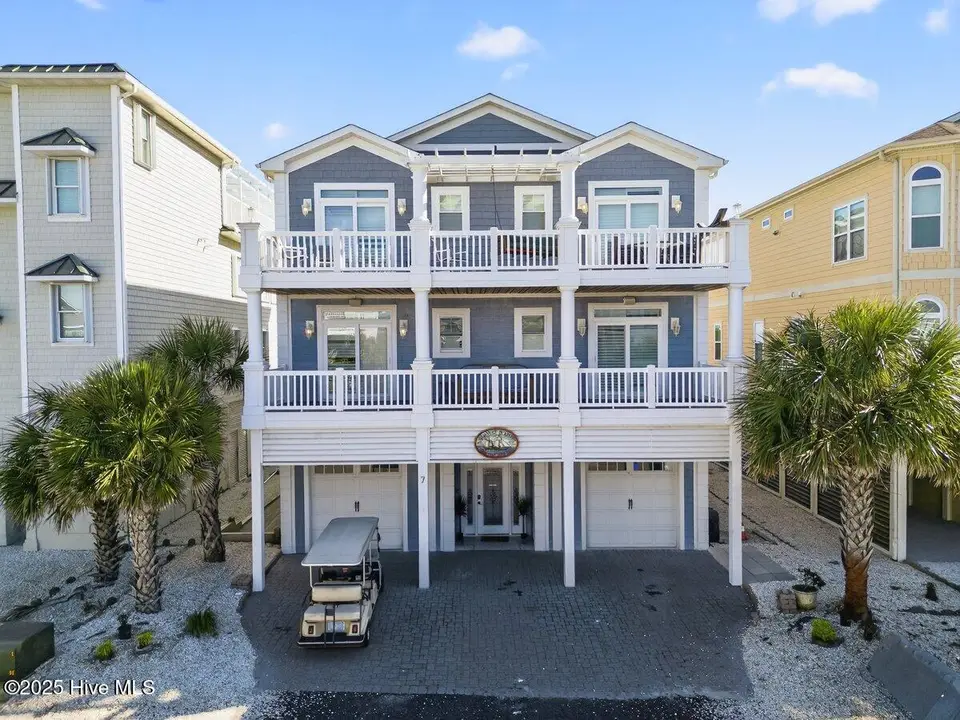 7 Coggeshall Drive W, Ocean Isle Beach, NC 28469 — 6-bedroom waterfront home in West Ocean Palms, Ocean Isle Beach, NC, photo 1 of 77: 7 Coggleshall