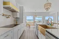 2205 E Beach Drive, Oak Island, NC 28465 — 6-bedroom waterfront home in Long Beach, Oak Island, NC, photo 9 of 55