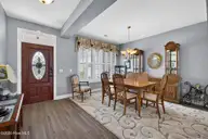 1230 Nightingale Court, Leland, NC 28451 — 3-bedroom waterfront home in Waterford of the Carolinas, Leland, NC, photo 18 of 75: Dining Room