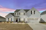 646 Indigo Johnston Drive, Jacksonville, NC 28546 — 5-bedroom home in Onslow Bay, Jacksonville, NC, photo 1 of 54: 1_virtual twilight