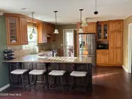 515 Fairway Drive W, Sunset Beach, NC 28468 — 3-bedroom home in Sea Trail Plantation, Sunset Beach, NC, photo 12 of 25: Kitchen Mann 1 copy
