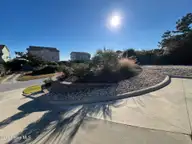 6414 Ocean Drive, Emerald Isle, NC 28594 — 5-bedroom waterfront home in Sea Crest, Emerald Isle, NC, photo 7 of 56: Front yard easy maintenance