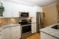 3 Gingham Place, Pinehurst, NC 28374 — 3-bedroom waterfront home in Unit 12, Pinehurst, NC, photo 9 of 45: UPDATED KITCHEN
