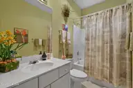 7429 Prestwick Court SW, Sunset Beach, NC 28468 — 3-bedroom home in Sandpiper Bay, Sunset Beach, NC, photo 21 of 41: Guest Bathroom