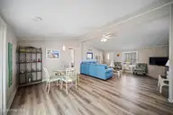 9105 W 9th Street, Surf City, NC 28445 — 3-bedroom waterfront manufactured home in Old Settlers Beach, Surf City, NC, photo 22 of 60: family room - 9105 9th St - Listing -20