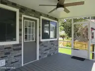 4111 Yarmouth Road, New Bern, NC 28562 — 3-bedroom home in Kings Row, New Bern, NC, photo 6 of 25: Screened Porch