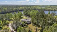 244 Shoreline Drive, New Bern, NC 28562 — 4-bedroom waterfront home, New Bern, NC, photo 1 of 70: 13-web-or-mls-DJI_20260414114508_0729_D