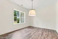 128 Banbridge Drive, Seven Lakes, NC 27376 — 4-bedroom home in Seven Lakes West, Seven Lakes, NC, photo 10 of 49: Dining room