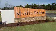 244 Maddox Drive, Aberdeen, NC 28315 — 3-bedroom home in Martin Farms, Aberdeen, NC, photo 3 of 25: Martin Farms Entrance Monument