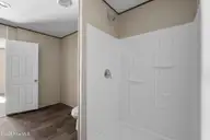 580 S Windward Drive SW, Supply, NC 28462 — 3-bedroom manufactured home in Ocean Trail II, Supply, NC, photo 17 of 32: Bathroom