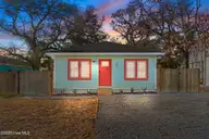 103 N Middleton Avenue, Oak Island, NC 28465 — 4-bedroom home in Tranquil Harbor, Oak Island, NC, photo 1 of 50