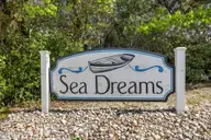 233 Sea Dreams Drive, Atlantic Beach, NC 28512 — 3-bedroom home in Sea Dreams, Atlantic Beach, NC, photo 7 of 68: SD sign