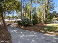 131 Oakleaf Drive, Pine Knoll Shores, NC 28512 — 3-bedroom waterfront home in Piksco, Pine Knoll Shores, NC, photo 5 of 35: Driveway