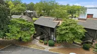 250 Sugar Gum Lane # 214, Pinehurst, NC 28374 — 2-bedroom waterfront condo in Lakeview Condos, Pinehurst, NC, photo 3 of 58: 5-web-or-mls-DJI_20260729133155_0052_D