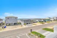 510 W Beach Drive, Oak Island, NC 28465 — 10-bedroom waterfront home, Oak Island, NC, photo 3 of 72: 510 W Beach 43