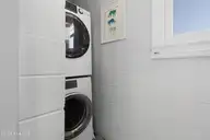 213 W Bogue Sound Drive, Atlantic Beach, NC 28512 — 3-bedroom waterfront home in Sound View Isles, Atlantic Beach, NC, photo 23 of 50: Laundry off of sun room